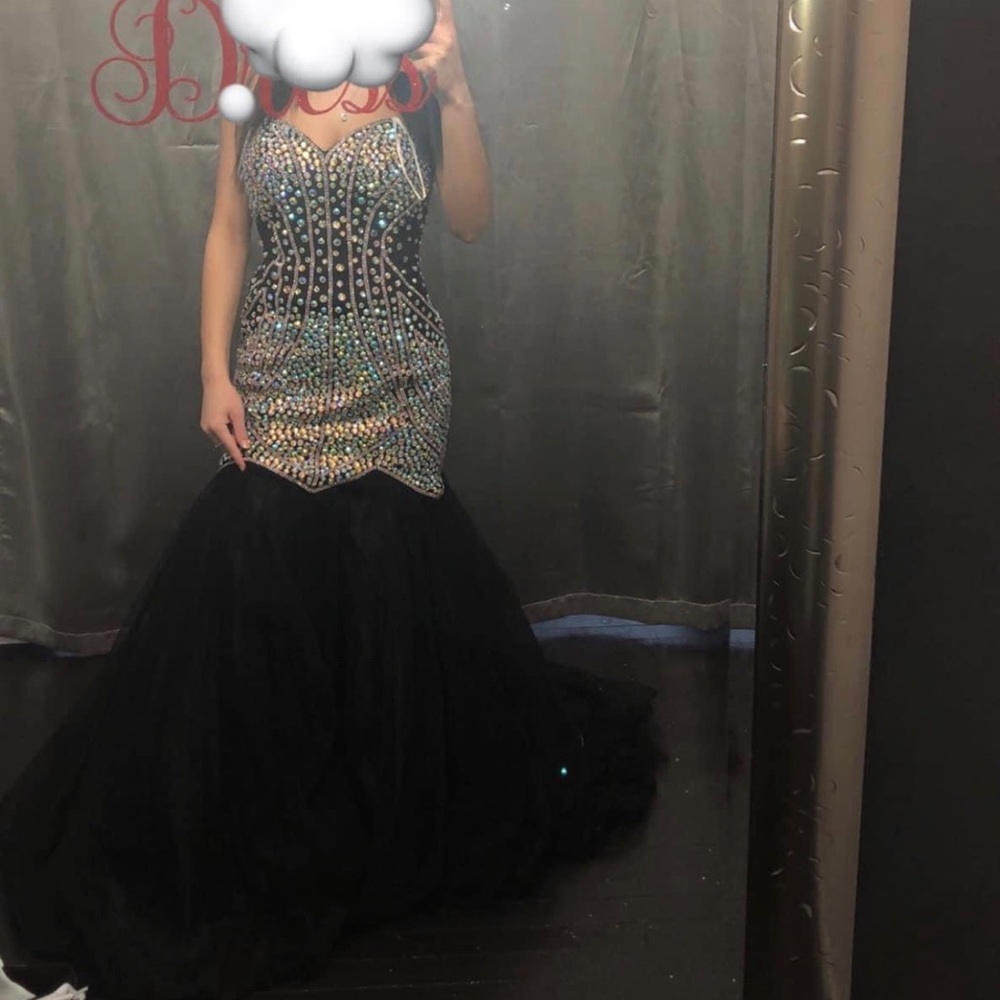 Beautiful Multi color gemstone dress with layer of tulle.